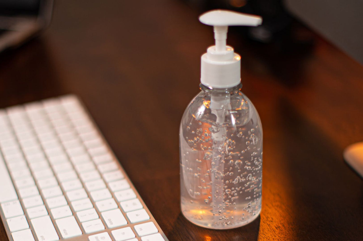 Bottle of Hand Sanitizer on Desk