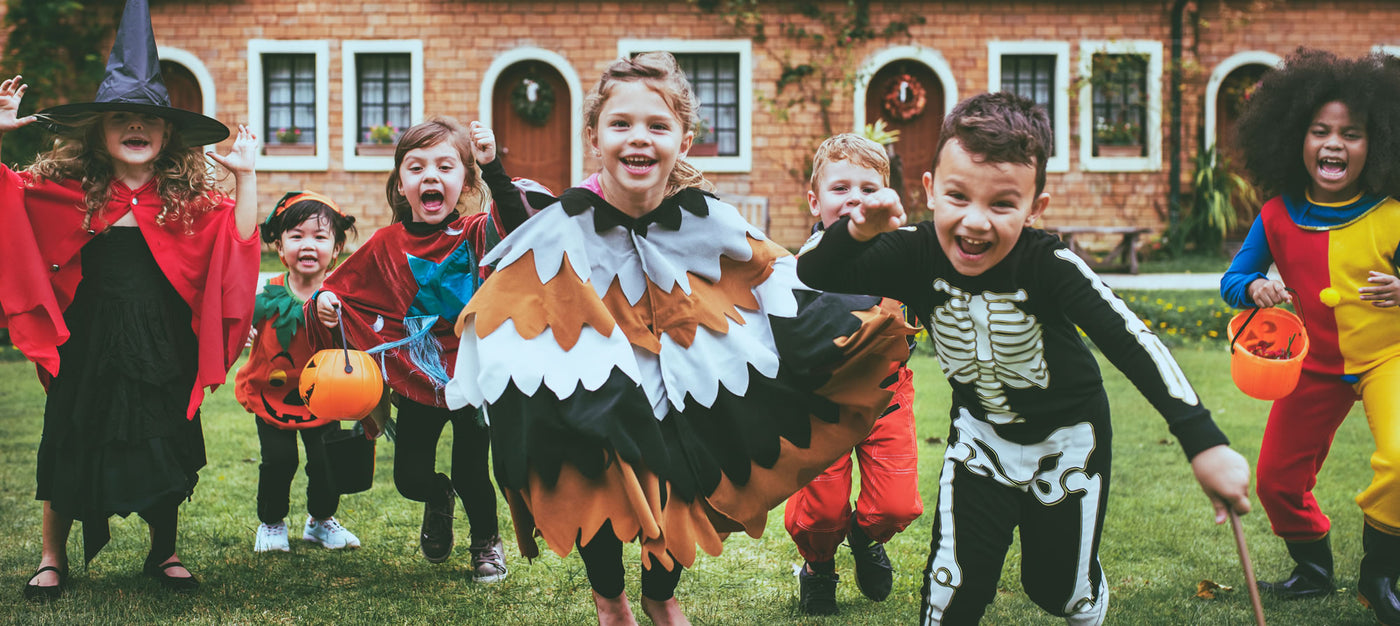 Kids in Halloween Costumes: The History of Masks