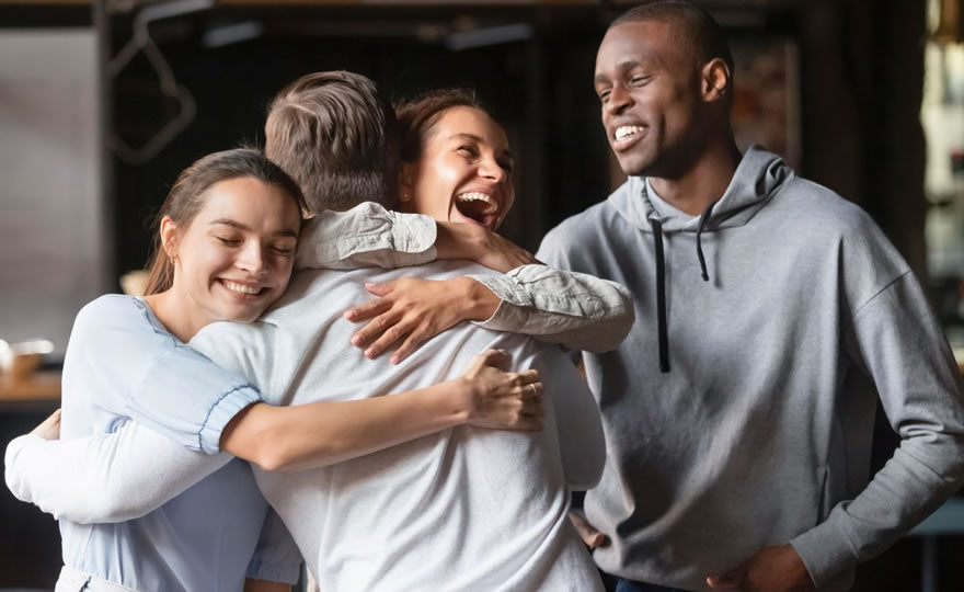 Friends Hugging: Social Distancing and Lessons Learned From COVID